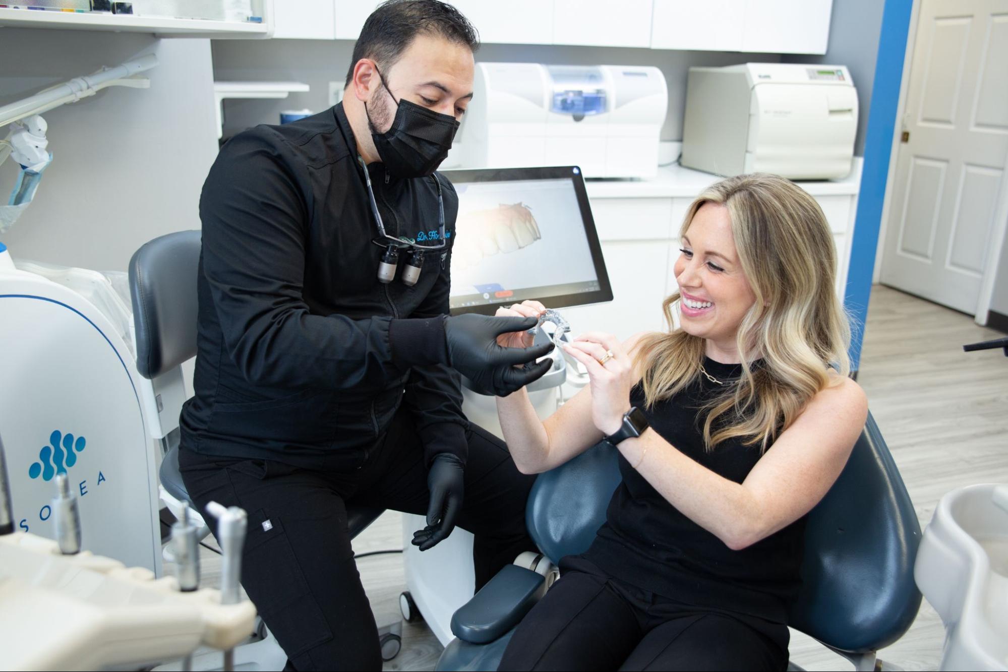 image2 Mundelein IL dentist talking to a female patient.