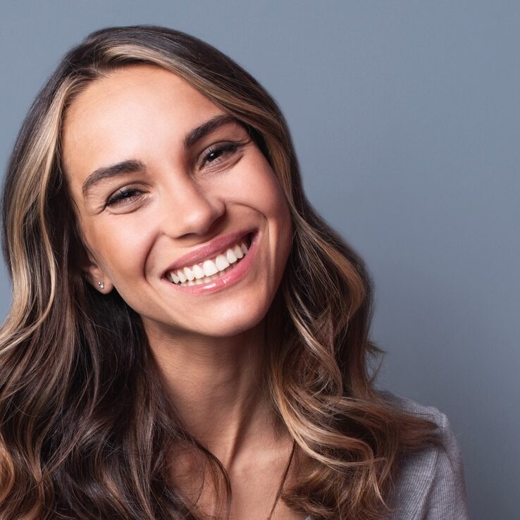 Beautiful woman smiling. Veneer photo